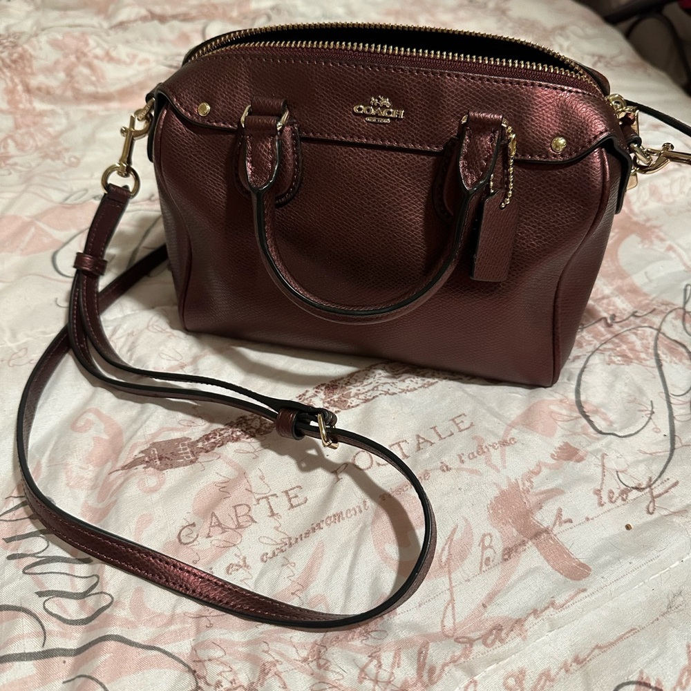 Coach red cherry metallic bennett bag. New without tags, never carried.